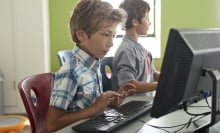 two children at computer