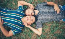 Couple lying on the grass