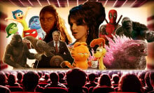 An movie theater with a screen full of characters from upcoming movies. 