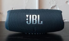 cylindrical speaker with JBL emblem