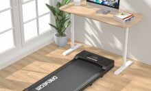 An under-desk treadmill paired with a standing desk