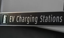 A sign that reads "EV Charging Stations".