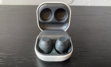 open earbuds charging case with earbuds inside