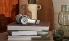 Beats Solo3 headphones rest on a stack of books