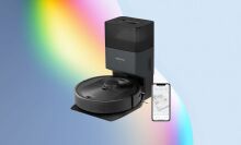 Roborock Q5+ robot vacuum on an abstract white and rainbow background