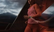 person running while wearing the pink apple watch series 9