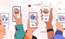 A series of hands holding smartphones with an array of dating app profiles showing men and women's faces. 