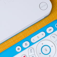 airplay against dandelion-colored background and sky blue/white remote