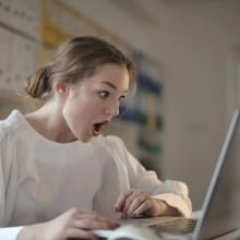 Girl staring at laptop