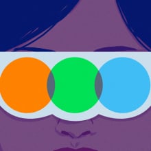 An illustration of a person's face in a dark theater. They are wearing white glasses that feature the Letterboxd logo. 