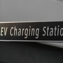 A sign that reads "EV Charging Stations".