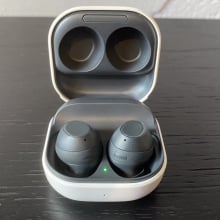 open earbuds charging case with earbuds inside