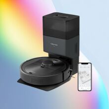 Roborock Q5+ robot vacuum on an abstract white and rainbow background