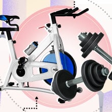 A stationary bike and a dumbbell on a colorful background