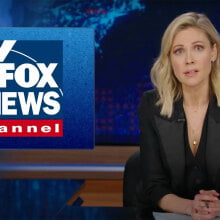 A woman sits behind a talk show desk with the Fox News logo visible top left.