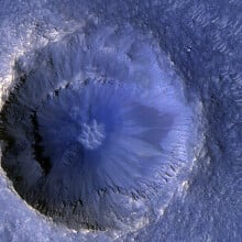 An impact crater on Mars captured by NASA's Mars Reconnaissance Orbiter.