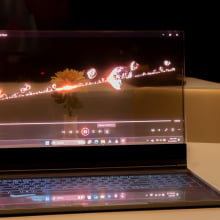 Lenovo ThinkBook Transparent Display laptop on a table