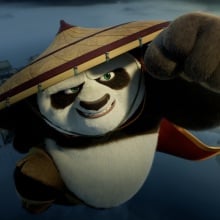 Po the panda flying towards an enemy with his fist outstretched.