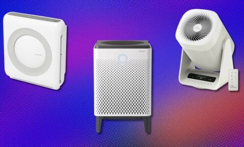 three coway air purifiers on a purple background
