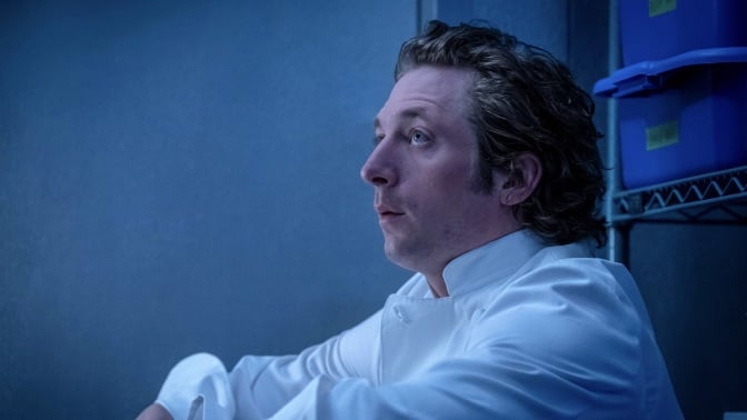 Jeremy Allen White, playing Carmen Berzatto in 'The Bear,' looks up at the inside of a walk-in fridge.  