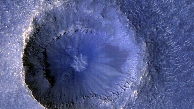 An impact crater on Mars captured by NASA's Mars Reconnaissance Orbiter.