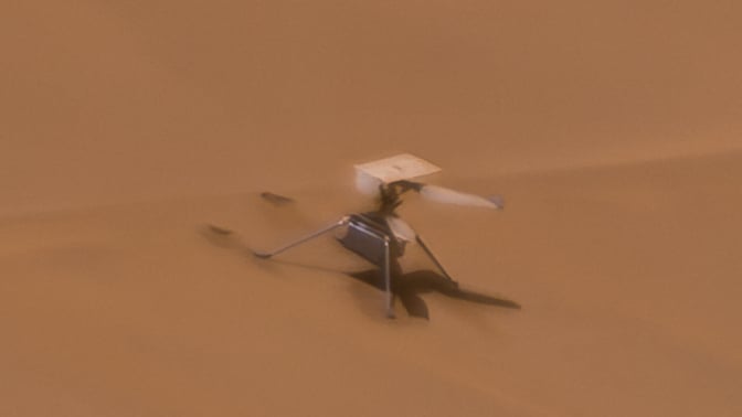 NASA's Ingenuity helicopter on the Martian desert floor. The craft made over 70 successful flights on Mars.