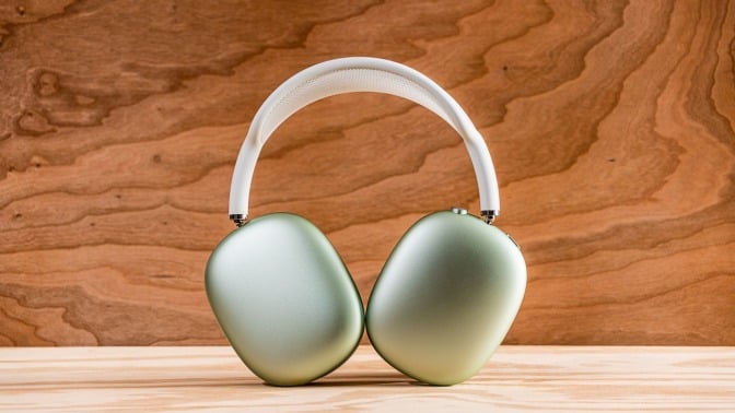 mint green apple airpods max headphones standing up