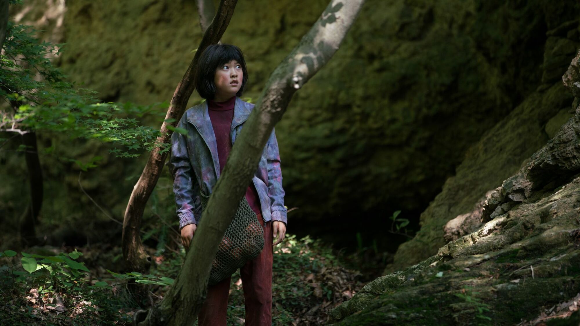 Young girl in the forest in "Okja"