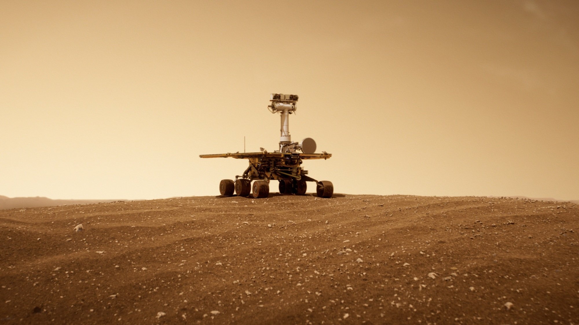 The Opportunity rover on the sandy surface of Mars.