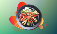 smokeless indoor grill with fajitas on colorful background