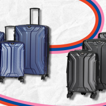 Vittorio Transmover luggage in black and blue with colorful swirl in background
