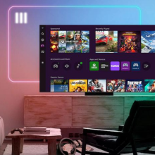 Samsung TV with apps on screen sitting on TV stand in colorful living room