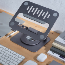 Casa Hub Stand Pro on desktop with keyboard, mouse, and other accessories