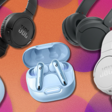 Wireless headphones from JBL, Sony, and Soundcore on orange background