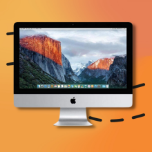 2015 iMac on orange background