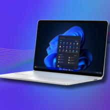 laptop using Windows 11 Pro software with blue gradient background