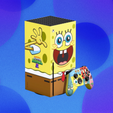Photo of the limited edition SpongeBob Xbox on a blue background.