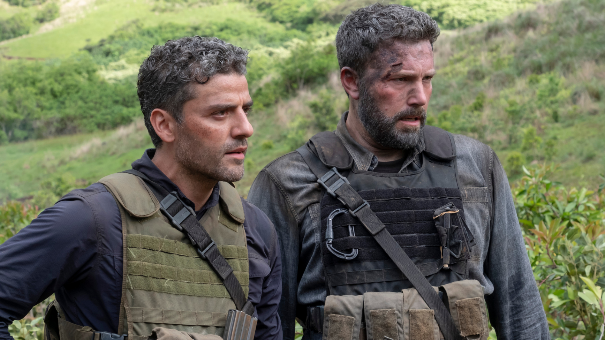 Oscar Isaac and Ben Affleck in a scene from "Triple Frontier"